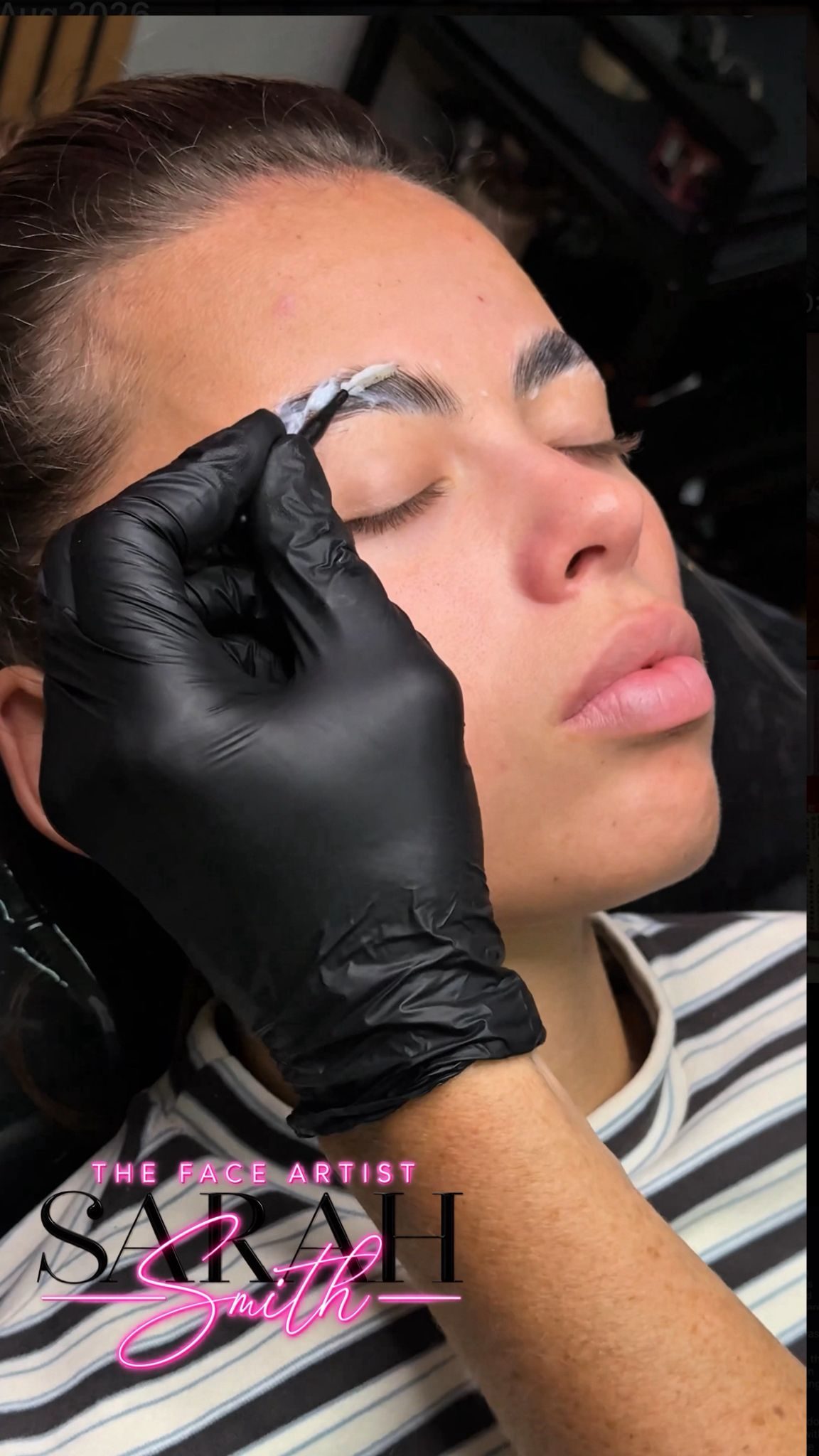 Brow tint being applied during a combination brow treatment