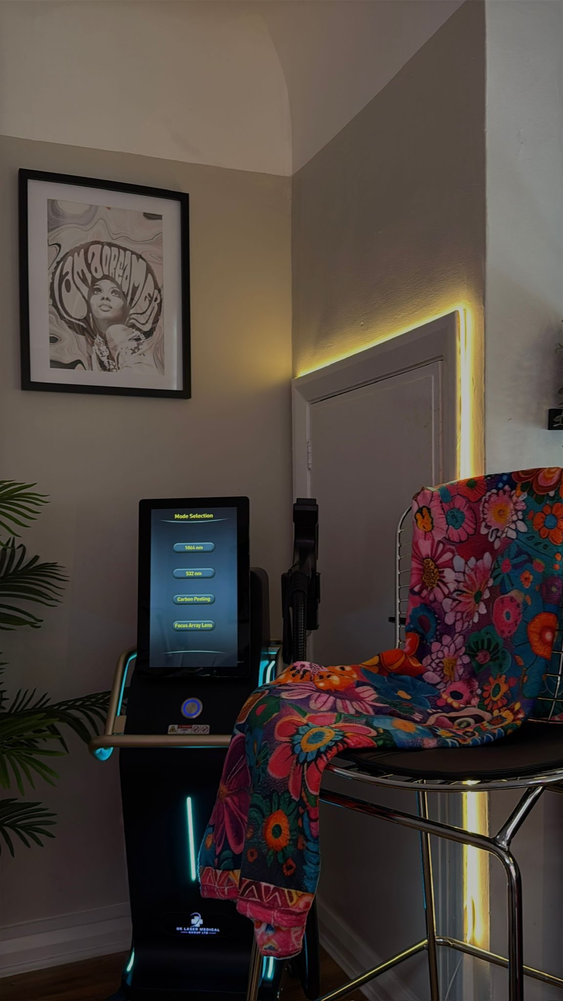 Sarah Smith's private PMU studio in Liverpool, with neon signage and laser removal equipment